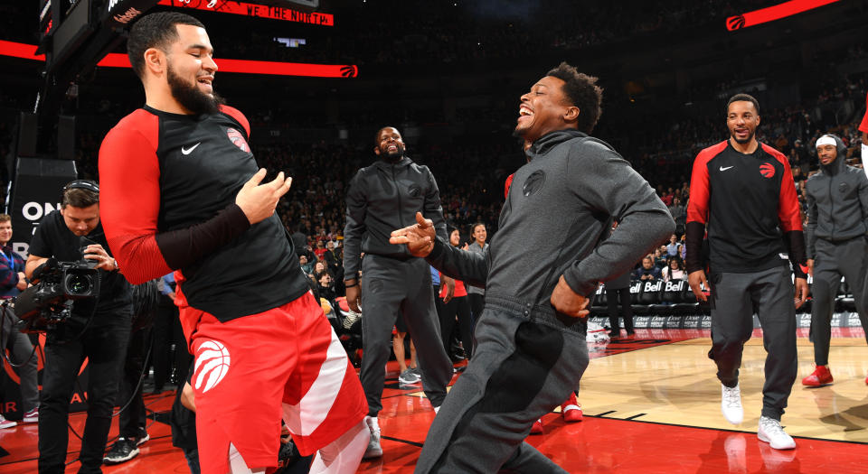 Toronto’s Kyle Lowry, right, seems to do most of his smiling when healthy and playing. (Photo by Ron Turenne/NBAE via Getty Images)