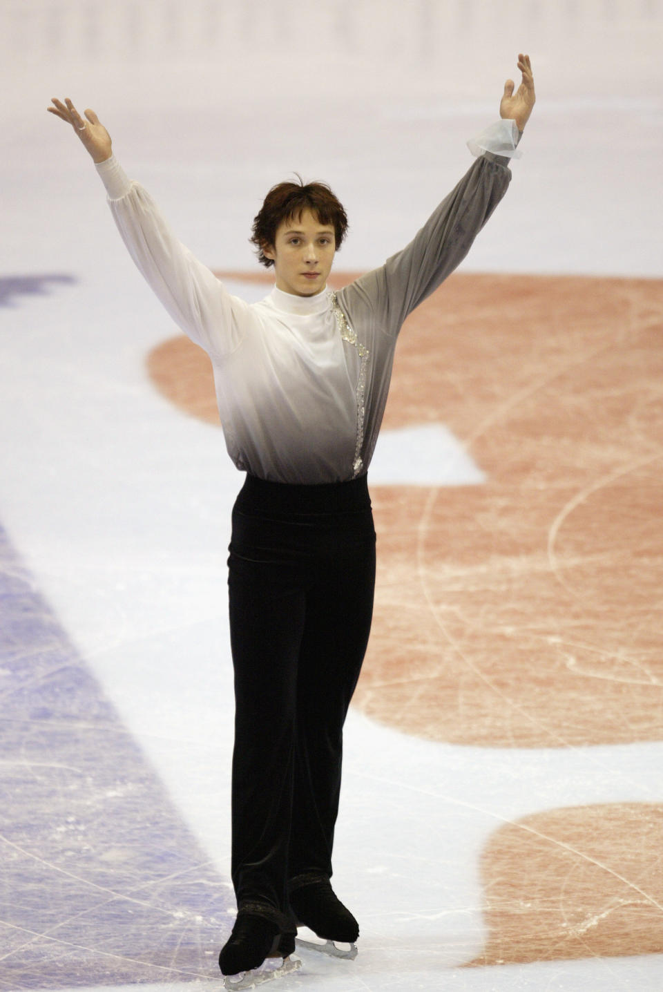 Finishing his program in the men's free skate at the State Farm U.S. Figure Skating Championships on Jan. 18, 2003, in Dallas.