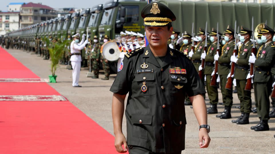 Hun Manet walks past an honour guard during a military ceremony in Phnom Penh on June 18, 2020. - Tang Chin Sothy/AFP/Getty Images