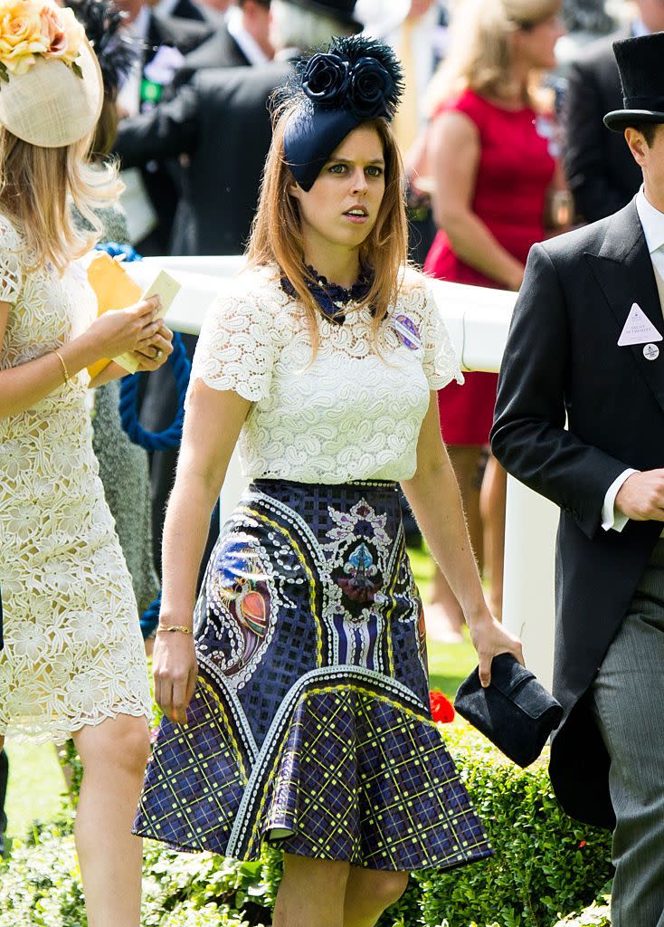 <p>This festively patterned skirt and collared blouse was a chic look for the Princess of York.</p>