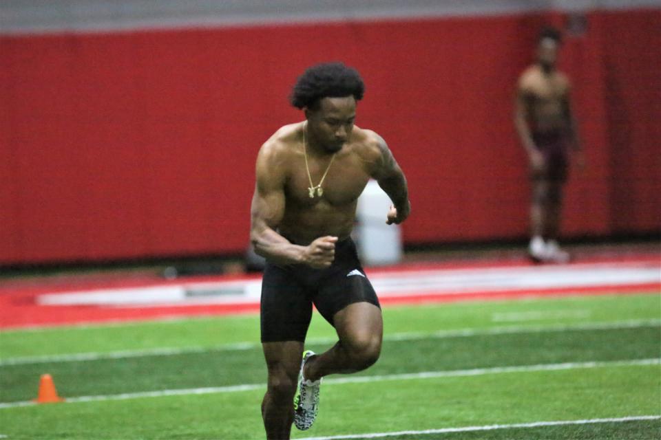 Ball State football cornerback Amechi Uzodinma II runs the 40-yard dash during the program's Pro Day at the Scheumann Family Indoor Practice Center on Monday, March 27, 2023.