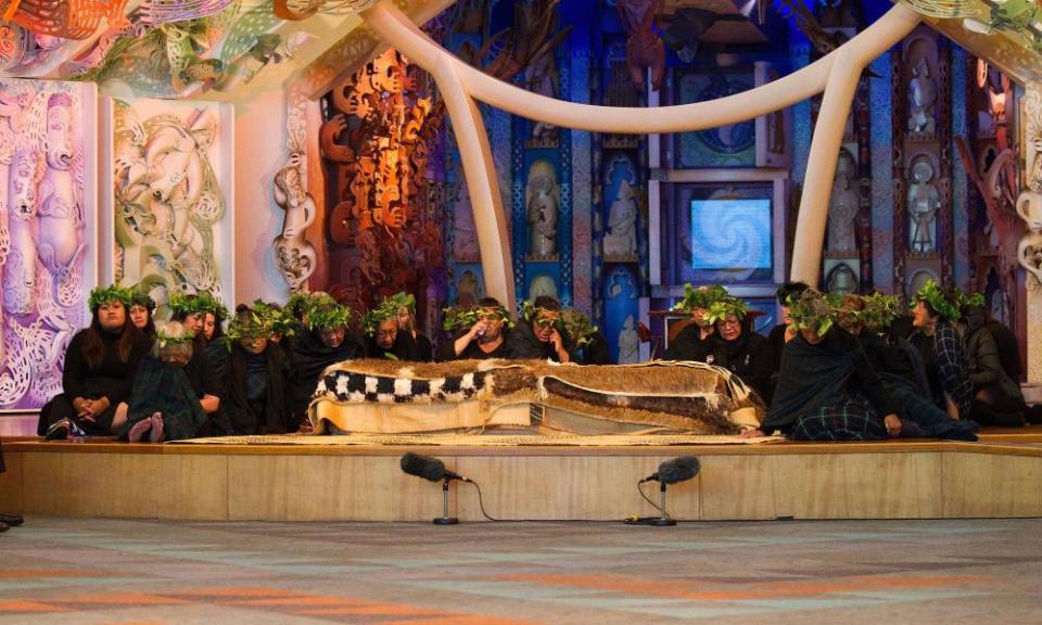 Members of The Tainui Waka Alliance tribe weep as they welcome 20 Maori mummified tattooed heads (toi moko) that were taken to Europe in the 1700s and 1800s, during a ceremony at Te Papa Museum in Wellington, New Zealand