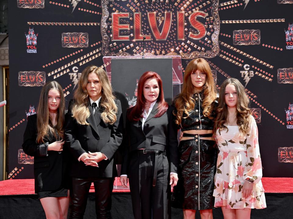 Harper Vivienne Ann Lockwood, Lisa Marie Presley, Priscilla Presley, Riley Keough, and Finley Aaron Love Lockwood attend the Handprint Ceremony honoring Three Generations of Presley's at TCL Chinese Theatre on June 21, 2022.