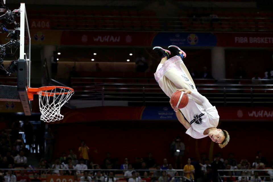 Basketball - FIBA World Cup - First Round - Group B - South Korea v Nigeria - Wuhan Sports Centre, Wuhan, China - September 4, 2019. A dunk artist performs during half time. REUTERS/Jason Lee     TPX IMAGES OF THE DAY