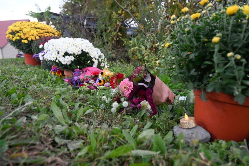 A memorial at the scene of the crash