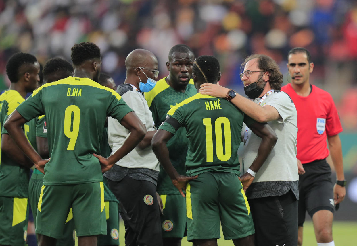 Soccer Football - Africa Cup of Nations - Round of 16 - Senegal v Cape Verde - Kouekong Stadium, Bafoussam, Cameroon - January 25, 2022 Senegal's Sadio Mane receives medical attention after sustaining an injury REUTERS/Thaier Al-Sudani