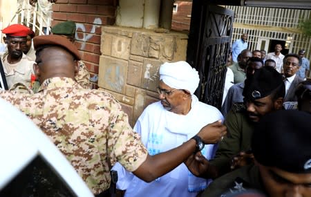 Sudan's ex-president Omar al-Bashir leaves the office of the anti-corruption prosecutor in Khartoum