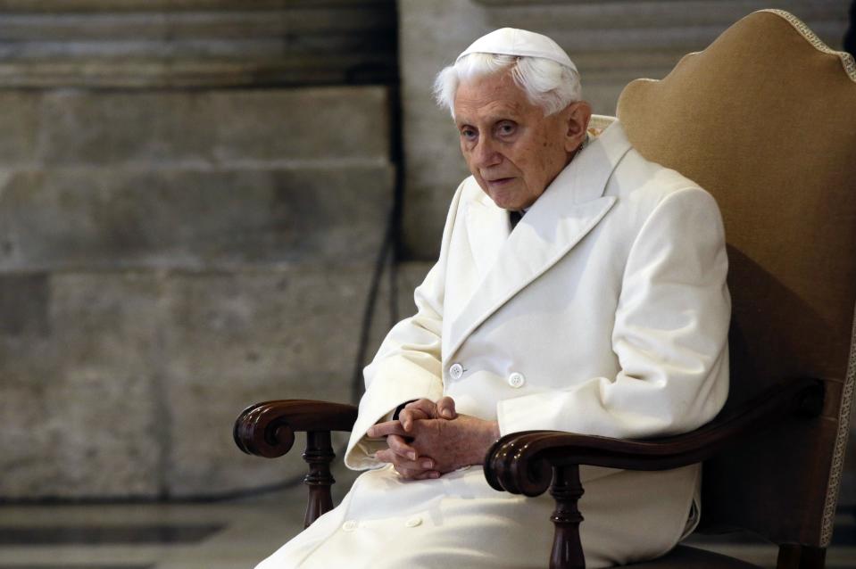 FILE - Pope Emeritus Benedict XVI attends a Mass prior to the opening of the Holy Door of St. Peter's Basilica, formally starting the Jubilee of Mercy, at the Vatican on Dec. 8, 2015. Pope Emeritus Benedict XVI, the German theologian who will be remembered as the first pope in 600 years to resign, has died, the Vatican announced Saturday. He was 95. (AP Photo/Gregorio Borgia, File)