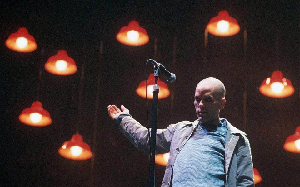 MIchael Stipe on stage at Milton Keynes, in 1995 - Shutterstock