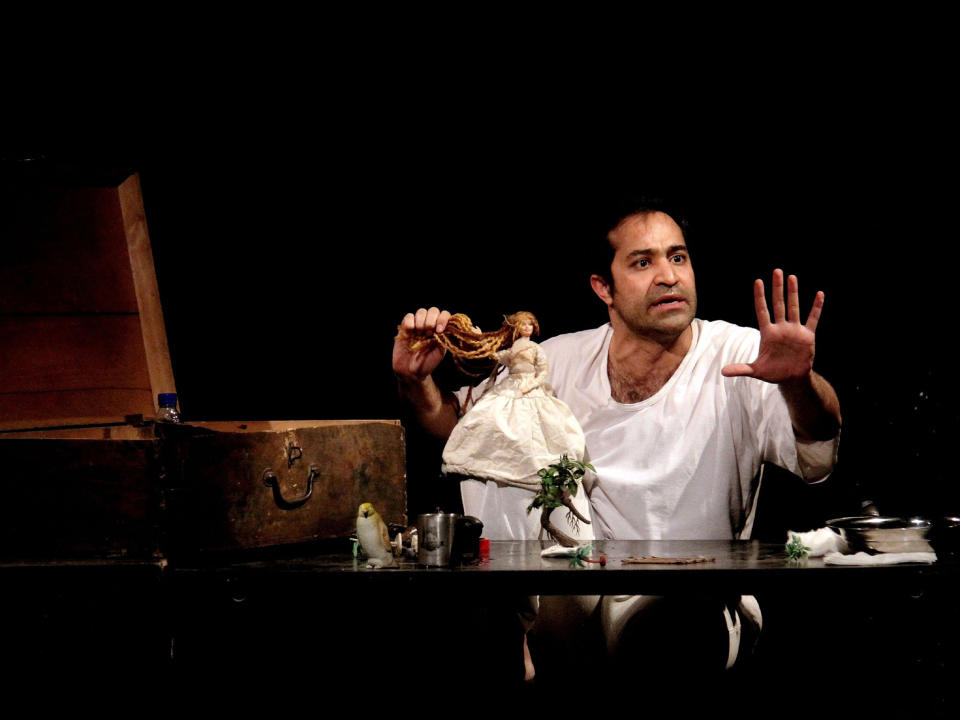 This undated image released by The Public Theater shows Iranian actor Afshin Hashemi in a scene from "Hamlet, Prince of Grief," running January 10-20 at The Public Theater at Astor Place as part of the Under the Radar Festival 2013. (AP Photo/The Public Theater, Medhi Shaban)
