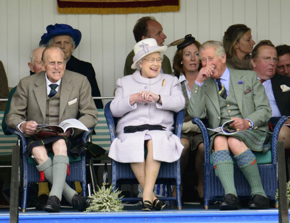 Prince Charles and Queen Elizabeth at the Braemar Highland Gathering in Scotland in 2012