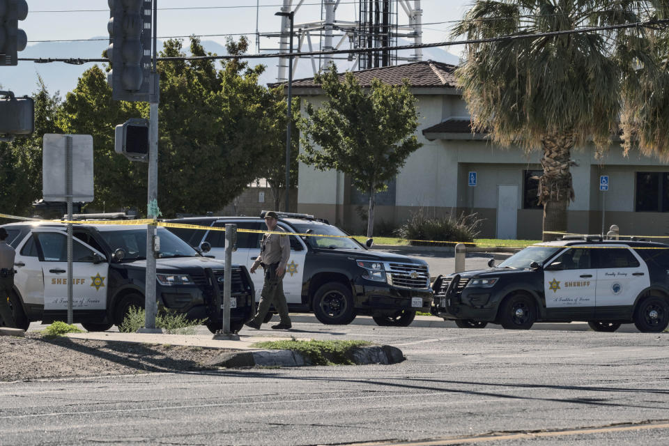 Sherriff's deputies block off a street where a deputy was shot while in his patrol car in Palmdale, Calif. on Sunday, Sept. 17, 2023. A Los Angeles County Sheriff's Department deputy has died after he was shot in his patrol car by an unknown assailant on Saturday. (AP Photo/Richard Vogel)