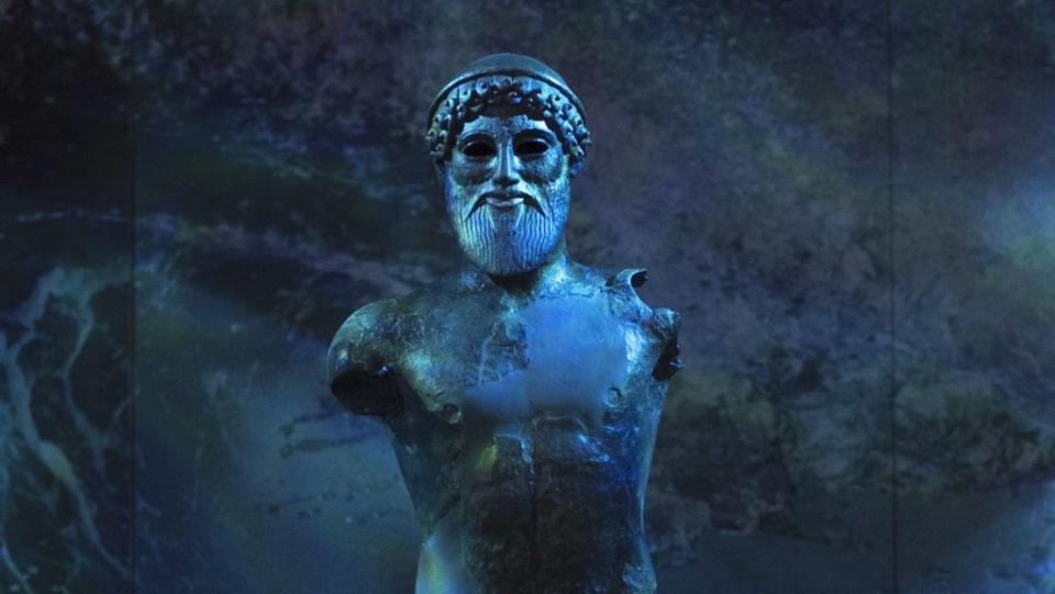 The 480 B.C bronze statue of the ancient Greek god of the sea, Poseidon, is displayed in a new exhibition of the National Archaeological Museum in Athens, on Monday, Sept. 26, 2016.