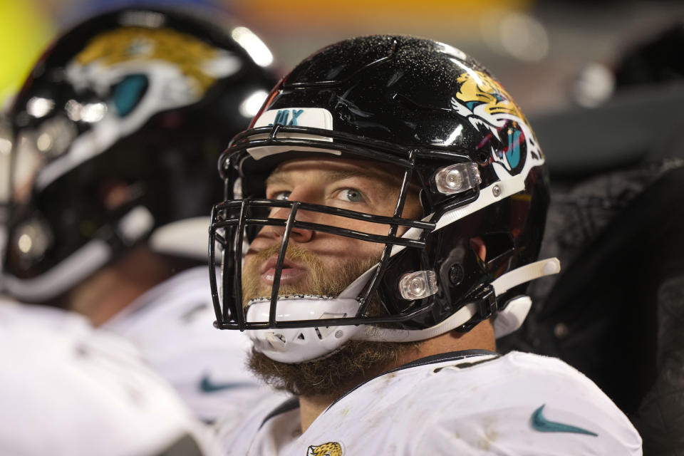 Jacksonville Jaguars center Tyler Shatley (69) sits on the bench during the second half of an NFL divisional round playoff football game between the Kansas City Chiefs and the Jacksonville Jaguars, Saturday, Jan. 21, 2023, in Kansas City, Mo. The Kansas City Chiefs won 27-20. (AP Photo/Charlie Riedel)