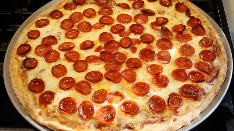 Pepperoni pizza on pan