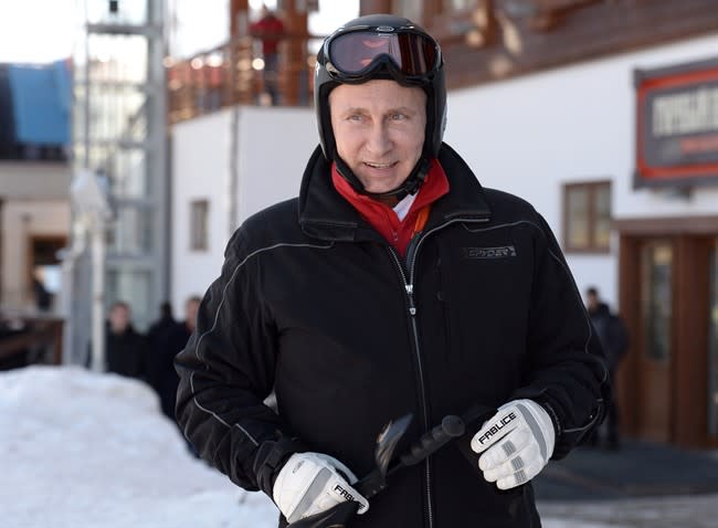 Russian President Vladimir Putin prepares to ski in the mountain resort of Krasnaya Polyana near the Black Sea resort of Sochi, southern Russia, Friday, Jan. 3, 2014. (AP Photo/RIA-Novosti, Alexei Nikolsky, Presidential Press Service)