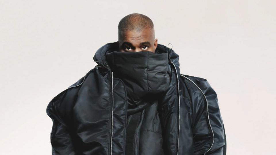 Ye ( Kanye West) wears an oversized black jacket in look 27 of the Y/Projectlookbook
