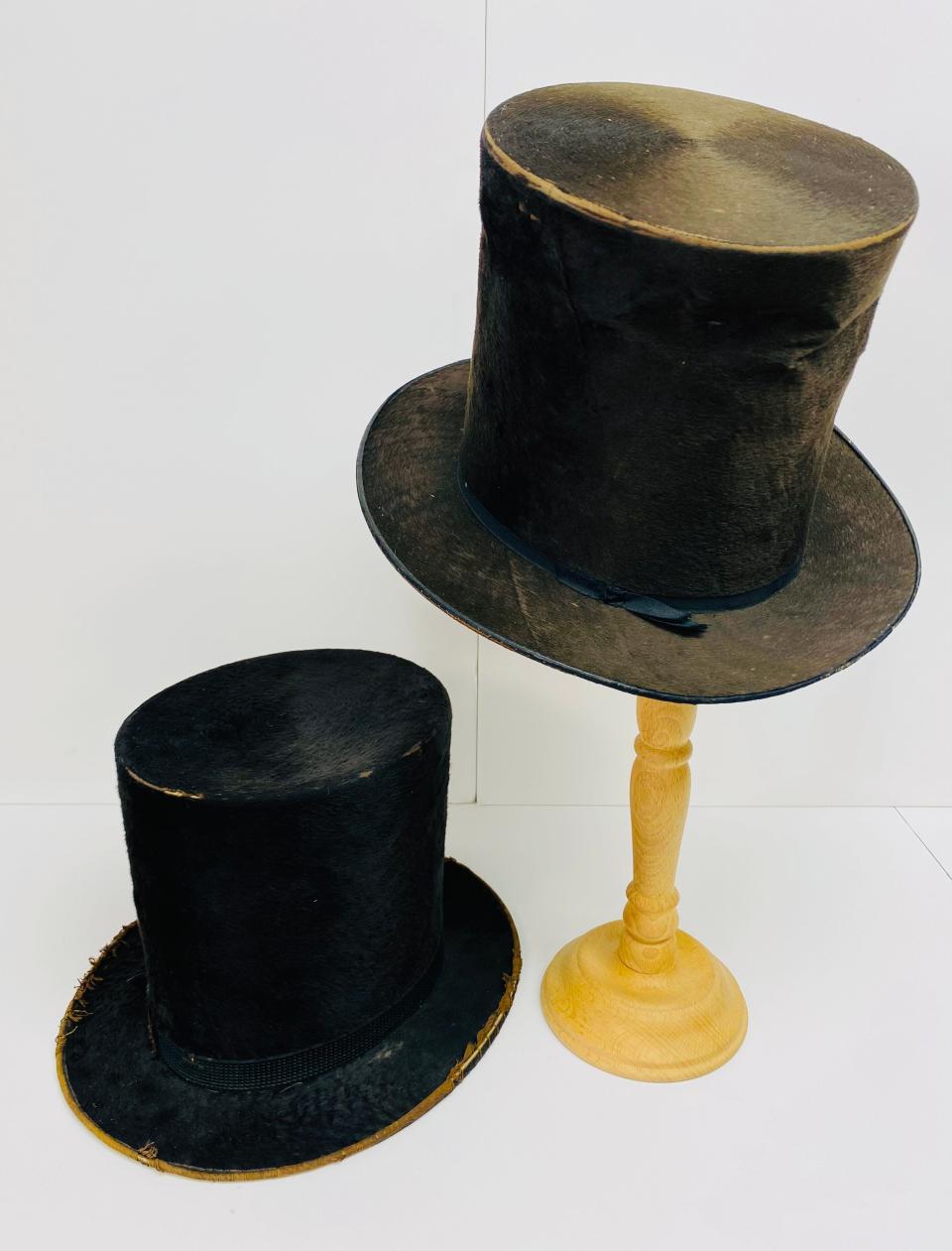 Two top hats circa 1850s in the Washington County Historical Society's collection, including an A.J. Downey top hat, left and an Updegraff & Co. top hat, right.