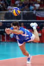 LONDON, ENGLAND - AUGUST 12: Cristian Savani #11 of Italy dives for the ball against Bulgaria during the Men's Volleyball bronze medal match on Day 16 of the London 2012 Olympic Games at Earls Court on August 12, 2012 in London, England. (Photo by Elsa/Getty Images)