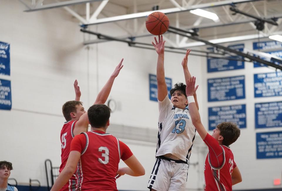 Suffern's Jake Polpolino (13) puts up a shot in the Class AA quarterfinal boys basketball game against Somers at Suffern High School on Thursday, Feb. 22, 2024.