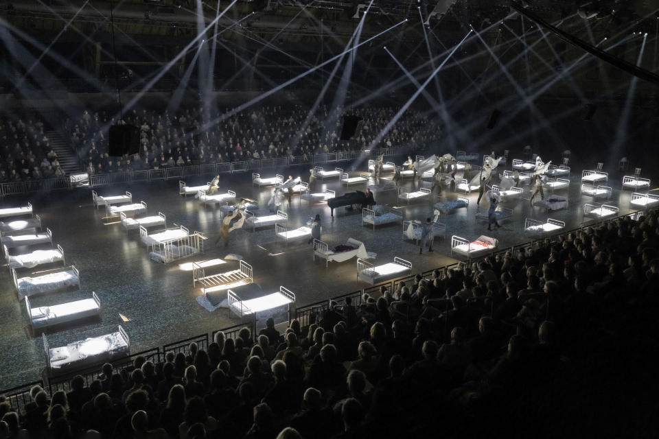 Pianist Helmut Deutsch, center, in a dress rehearsal of “Doppleganger” by director Claus Guth at the Park Avenue Armory in New York on Sept. 23, 2023. (Monika Rittershaus/Park Avenue Armory via AP)