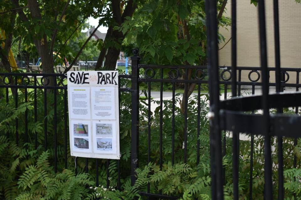 A sign reading 'Save our Park' hangs on the fence outside the Plant Recreation Centre in Ottawa.