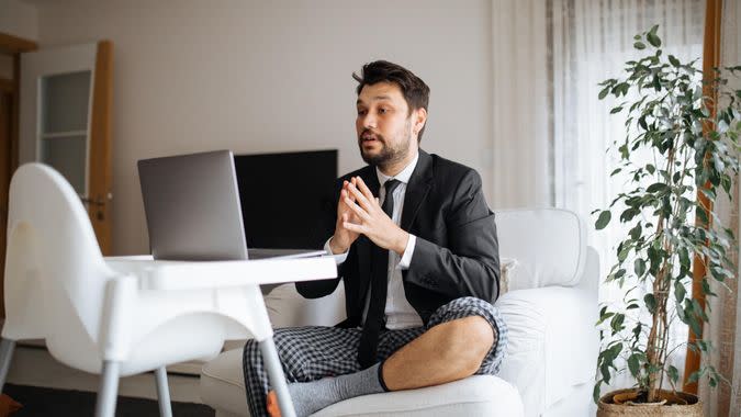 Young businessman at home.