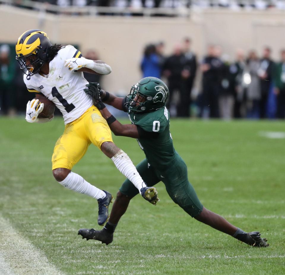 Michigan State Spartans cornerback Charles Brantley (0) defends Michigan Wolverines wide receiver Andrel Anthony during the second half Saturday, Oct. 30, 2021 at Spartan Stadium in East Lansing. The pass was ruled incomplete.