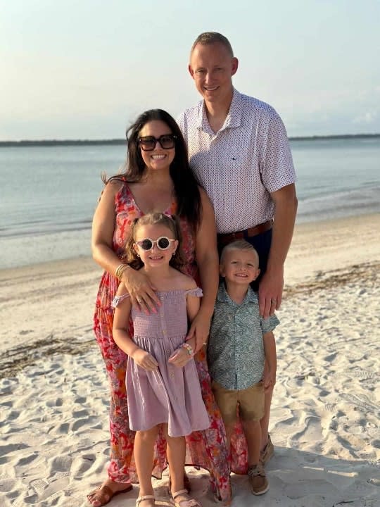 Bryan Hagerich and his family on the beach