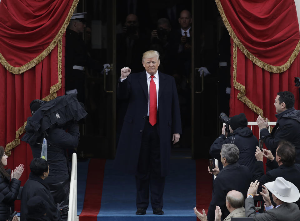 <p>President-elect Donald Trump pumps his fist as he arrives for his Presidential Inauguration at the U.S. Capitol in Washington, Friday, Jan. 20, 2017. (Photo: Patrick Semansky/AP) </p>