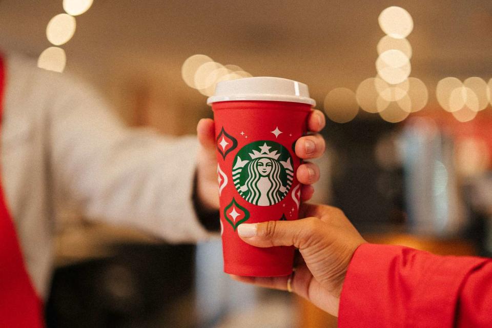 <p>Starbucks</p> Starbucks will hand out free reusable red cups on Thursday