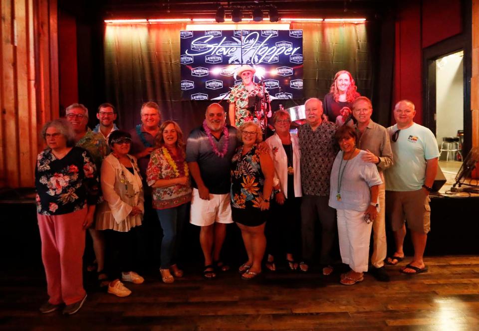 The Parrot Head Club of Memphis can be seen at a get together to honor Jimmy Buffett at Lafayette's Music Room in Memphis, Tenn., on Sept. 4, 2023.