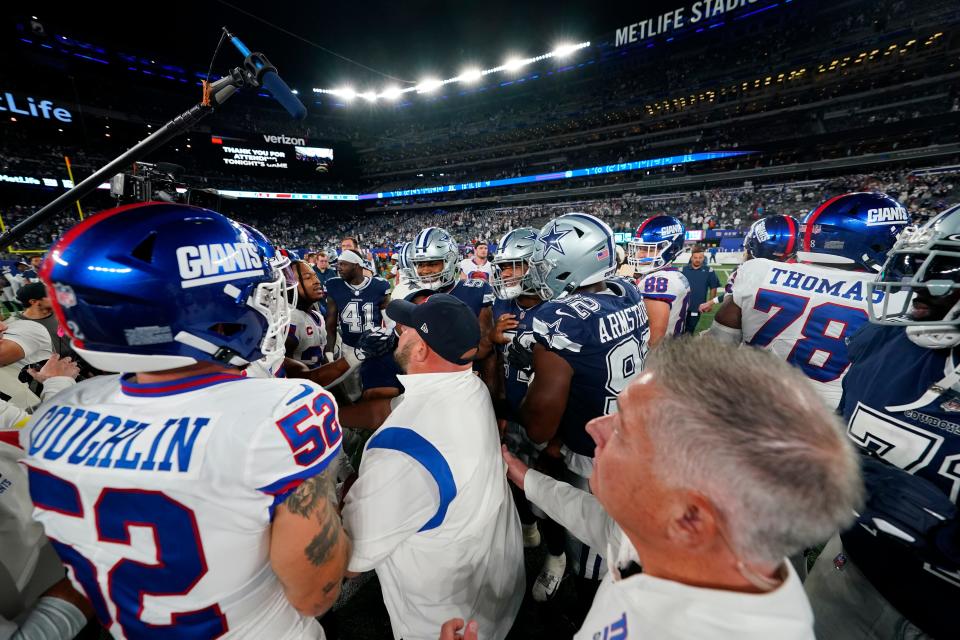 New York Giants head coach Brian Daboll breaks up Giants and Dallas Cowboys players after the game. The Giants fall to the Cowboys, 23-16, at MetLife Stadium on Monday, Sept. 26, 2022.<br>Nfl Ny Giants Vs Dallas Cowboys Cowboys At Giants