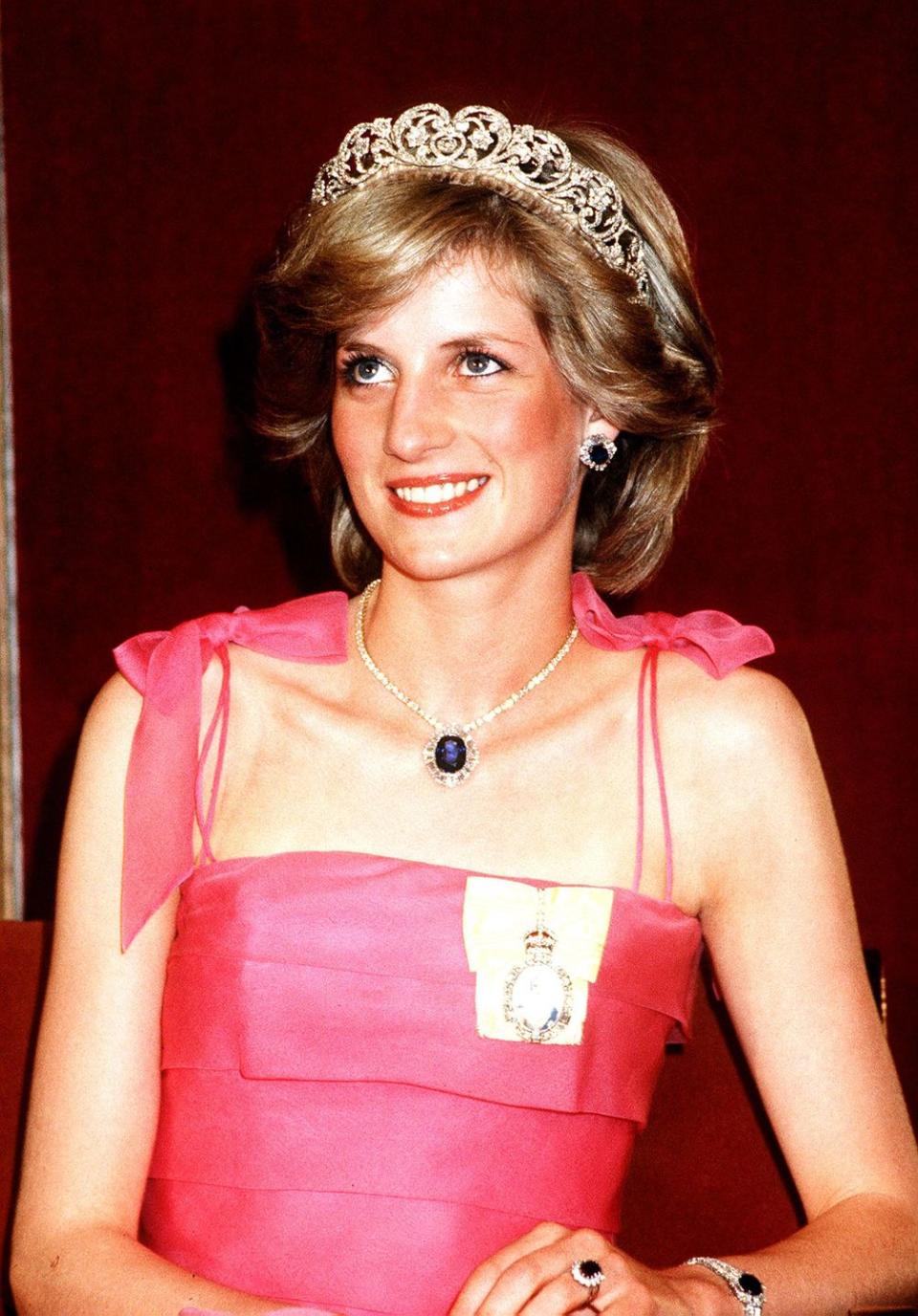 <p>Diana busted out her major jewels for this event. This sapphire and diamond necklace match her engagement ring, and were casually given to her by the Saudi royal family on her wedding day.</p>