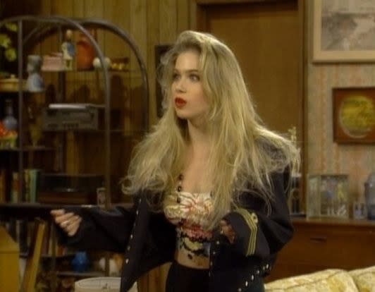 Kelly Bundy&#39;s (Christina Applegate), from&#xa0;Married... with Children, messy layered hair with bangs is such a motif of the 1980s 