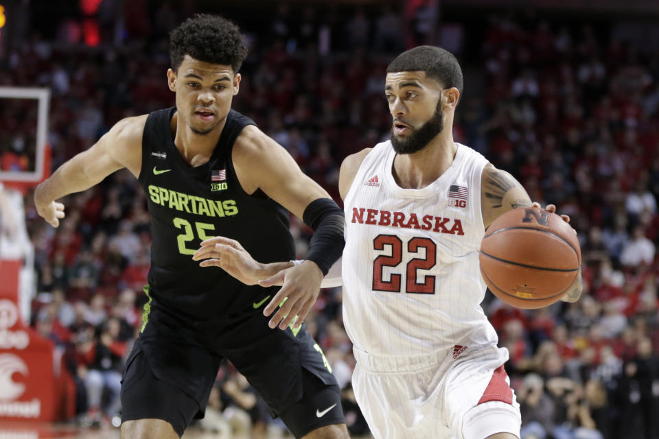 Nebraska's Haanif Cheatham (22) drives to the basket around Michigan State's Malik Hall (25) during the first half of an NCAA college basketball game in Lincoln, Neb., Thursday, Feb. 20, 2020. (AP Photo/Nati Harnik)