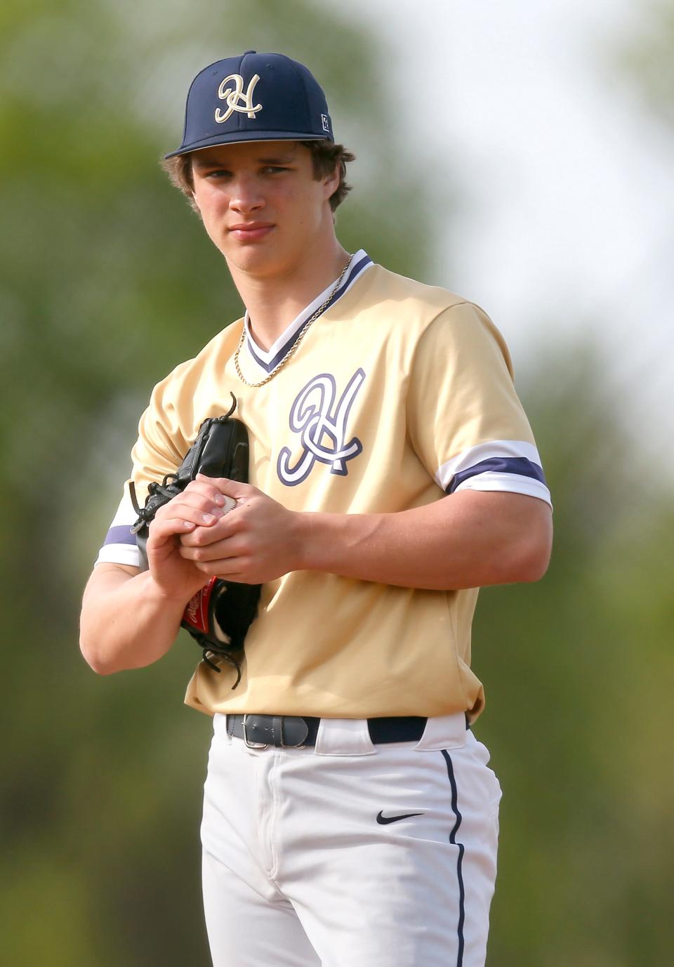 Heritage Hall's Jackson Jobe prepares to pitch during a high school baseball game between Heritage Hall and Harrah at Heritage Hall High School in Oklahoma City, Tuesday, April 13, 2021. 