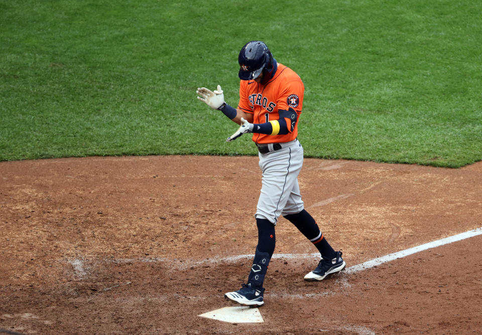 Carlos Correa of the Houston Astros celebrates his go-ahead home run in Game 2 of the wild-card series. (Photo by Jordan Johnson/MLB Photos via Getty Images)