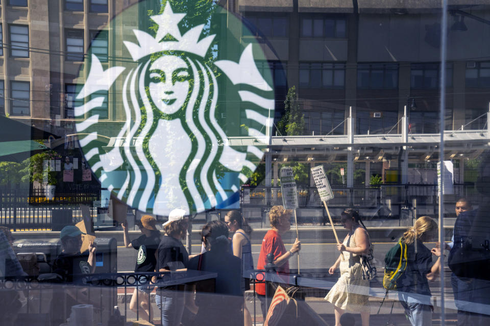 Unionized workers strike for unfair labor practices outside a Starbucks location in the Brookline neighborhood of Boston, Massachusetts, US, on Tuesday, July 19, 2022.  (M. Scott Brauer / Bloomberg via Getty Images)