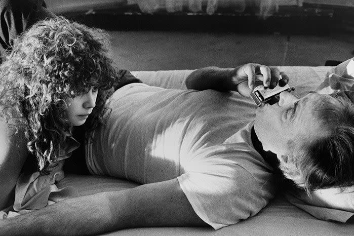 Maria Schneider lies next to Marlon Brando in a scene from the film 'Last Tango In Paris'. Image: Getty