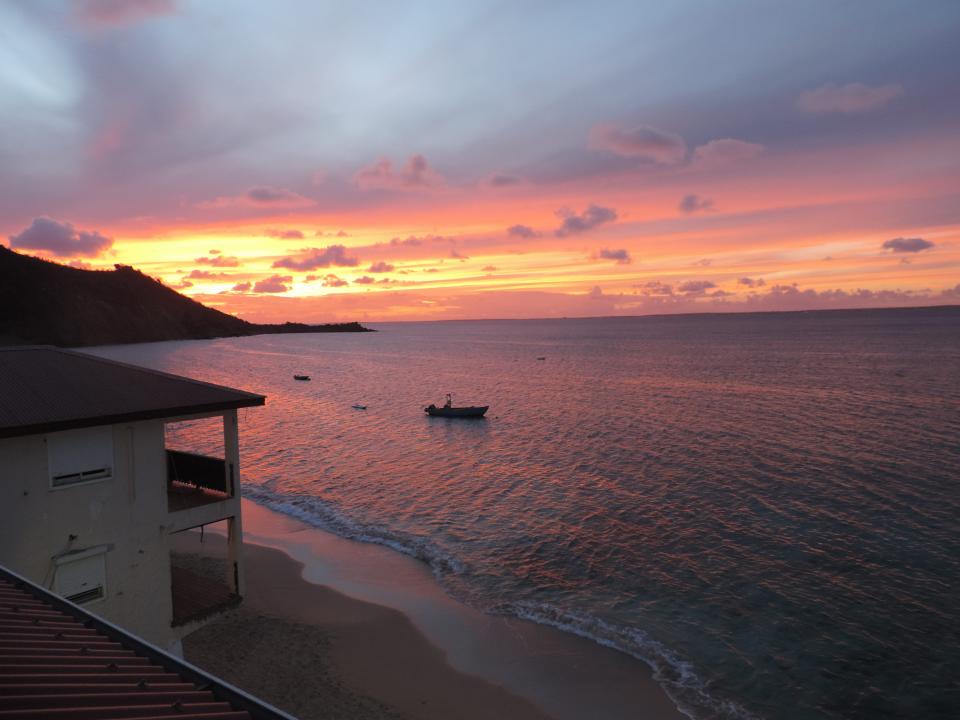 Sun setting over Le Petit Hotel in St. Martin.