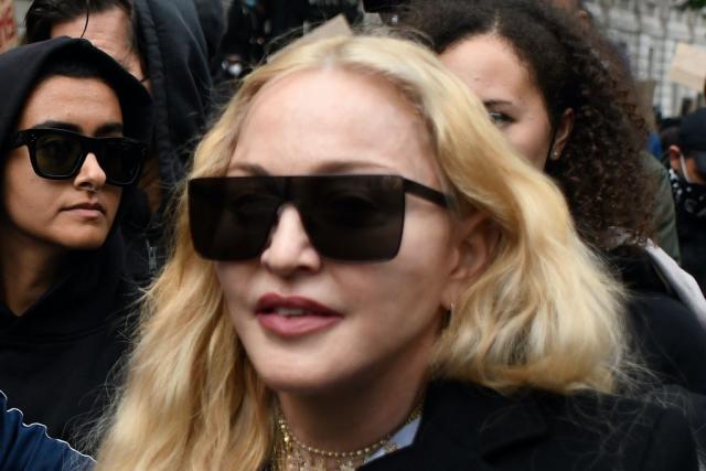 Image of Madonna (wearing a Louis Vuitton dress) at arrivals for The