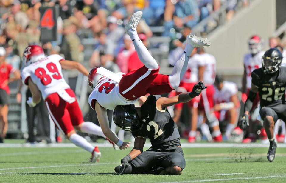 Army outside linebacker Malkelm Morrison (2) deflects a punt by Miami (Ohio) RedHawks punter Dom Dzioban (31) on September 25. DANNY WILD/USA TODAY Sports