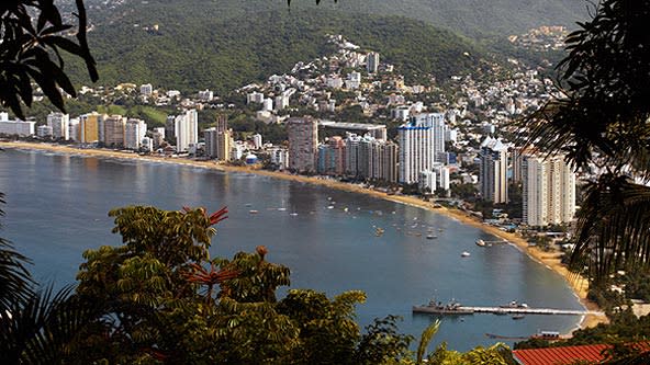 Surrounded by lush greenery, rolling mountains, and clear skies and waters, Acapulco, Mexico is an ideal tropical paradise.