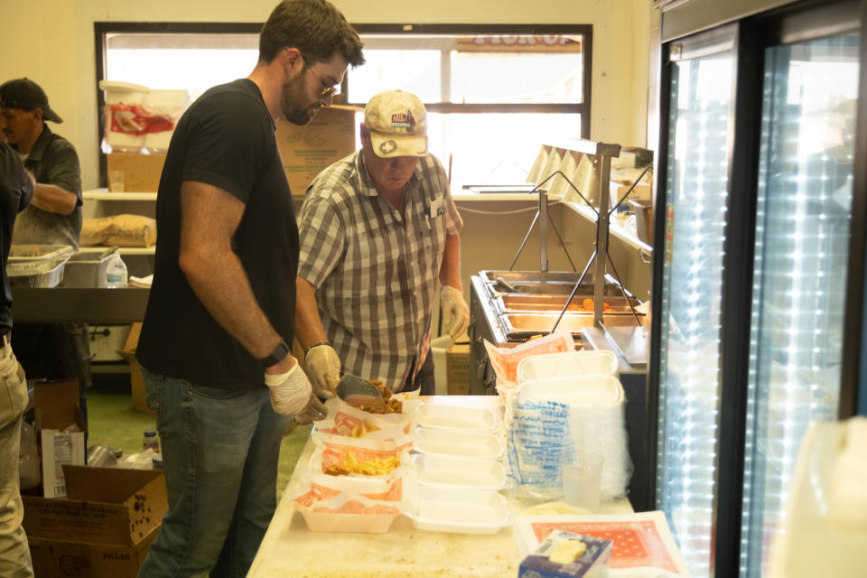 Co-Owner of the Big Texan Danny Lee and his nephew Patrick Lee prepare calf fries for patrons Saturday evening at the 1st annual Calf Fry Festival at the Starlight Ranch Event Center in Amarillo.