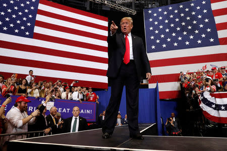 U.S. President Donald Trump greets the crowd as he holds a Make America Great Again rally at Nashville Municipal Auditorium in Nashville, Tennessee, U.S., May 29, 2018. REUTERS/Leah Millis