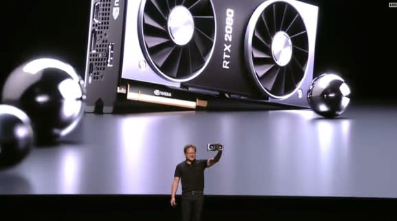 Jensen Huang shows off the Nvidia GeForce RTX 2080 Ti.