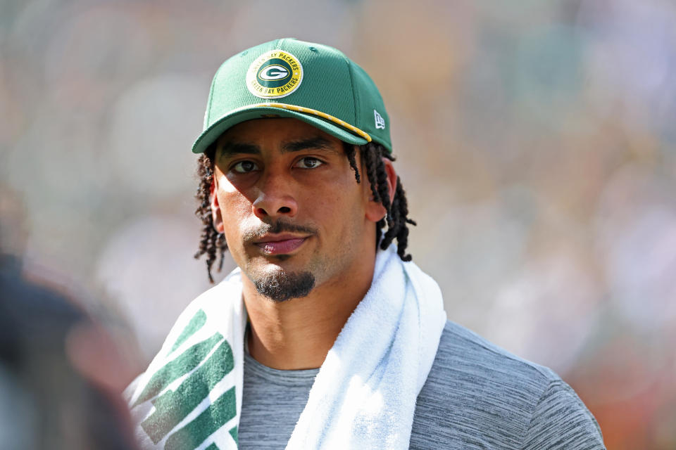 Jordan Love was in street clothes for Sunday's win over the Colts. (Stacy Revere/Getty Images)