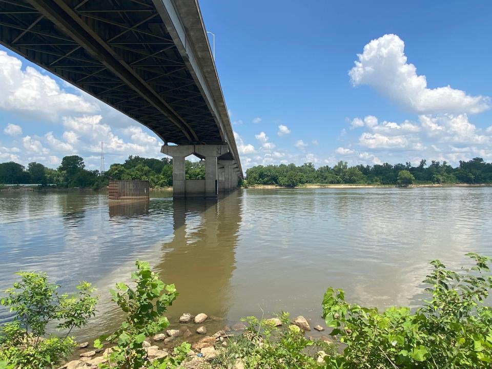 A man jumps from the Garrison Avenue bridge into the Arkansas River on Saturday, July 2. He was successfully rescued and taken to the hospital.