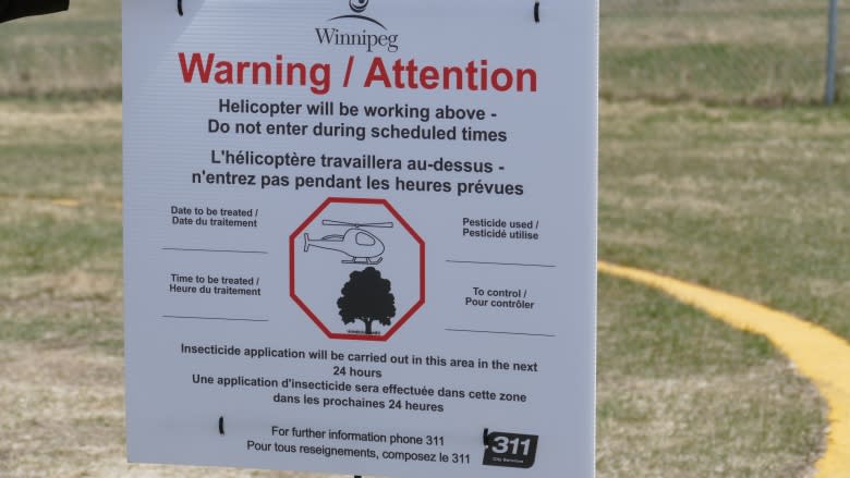 Look, overhead: New signs will warn of mosquito larvae-killing choppers